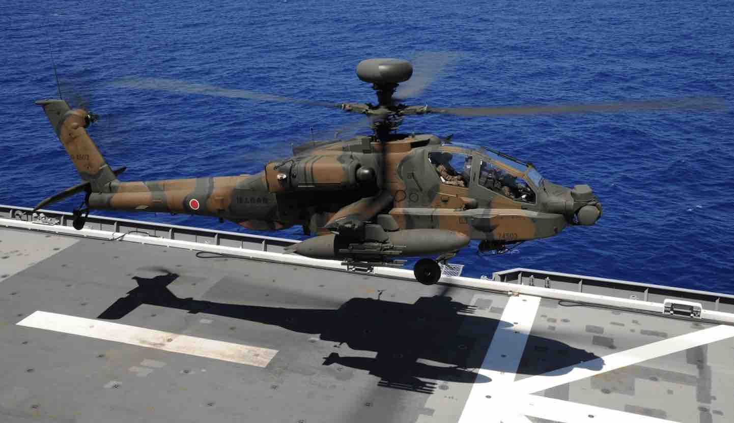 Japanese Apache helicopter landing on a carrier