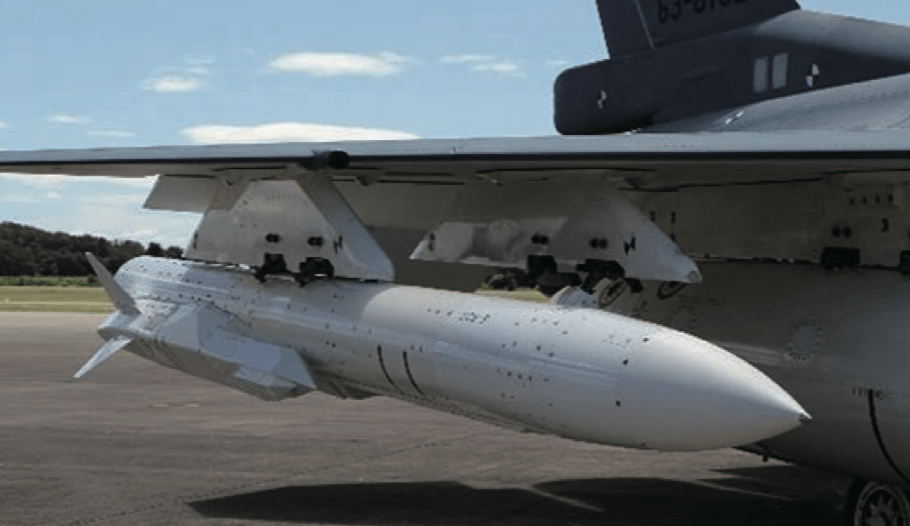 a missile loaded on a fighter jet
