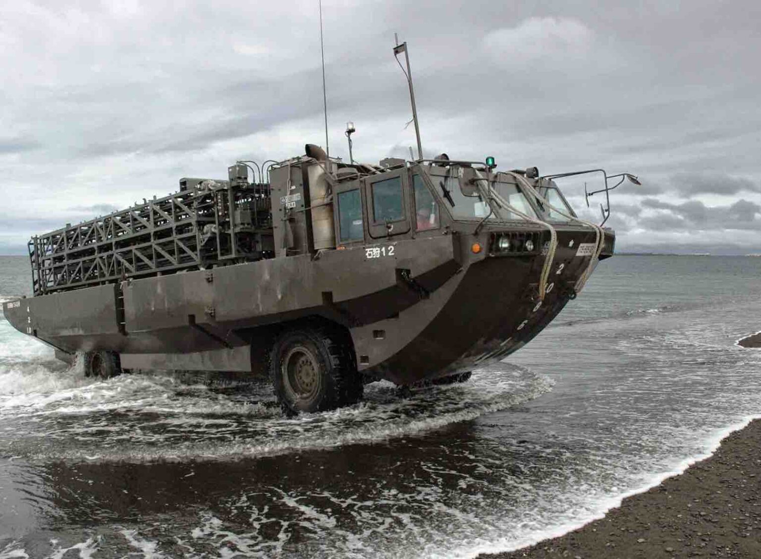an amphibious vehicle landing ashore